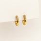Pendientes Lumi Gold en expositor