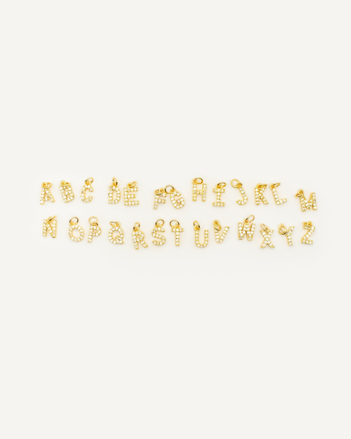 Charm Letra circonitas Gold